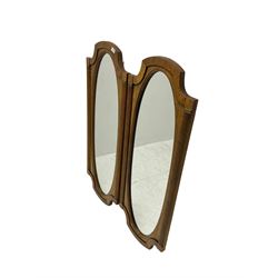 Pair walnut finish wall mirrors, shaped frame with reeded uprights, moulded slip