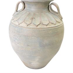 Two large Thai storage jars, with repeating leaf boarder to the neck