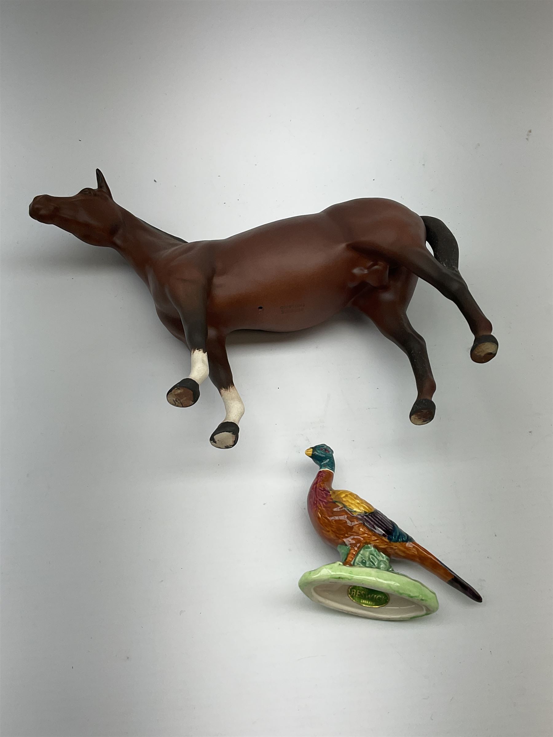 Four Capodimonte figures, comprising Shoemaker by T Galli, Tramp on Bench by Roby B, The Fiddler by Maria Angela, and Gypsy Dancers by Sandro, each with accompanying certificate, plus a Beswick matt glazed horse, and small Beswick pheasant. 