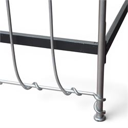 And So To Bed - 'Squigalina' silvered metal framed 5ft king size four poster bed, the tubular chrome posters in scrolling foliate form, over a shaped and scroll-topped metal spindle headboard and footboard