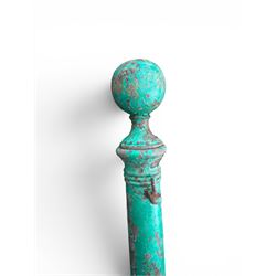 19th century circular cast iron gate post with finial, painted in distressed green finish