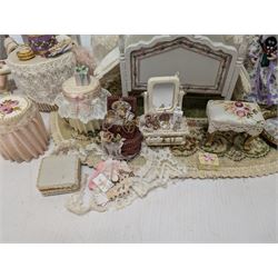 Dolls house bedroom and dressing room furniture, including beds, wardrobe, dressing table, lamps, tables, two figures and a collection of accessories