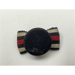 Four German awards - pre-WW2 two-position button hole ribbon for 1914 Iron Cross; WW1 wound badge open back cut-out version with silvered finish; miniature version Mother's Cross with ribbon bow; and The Eastern Medal, officially the Winter Battle in the East 1941–42 Medal (4)