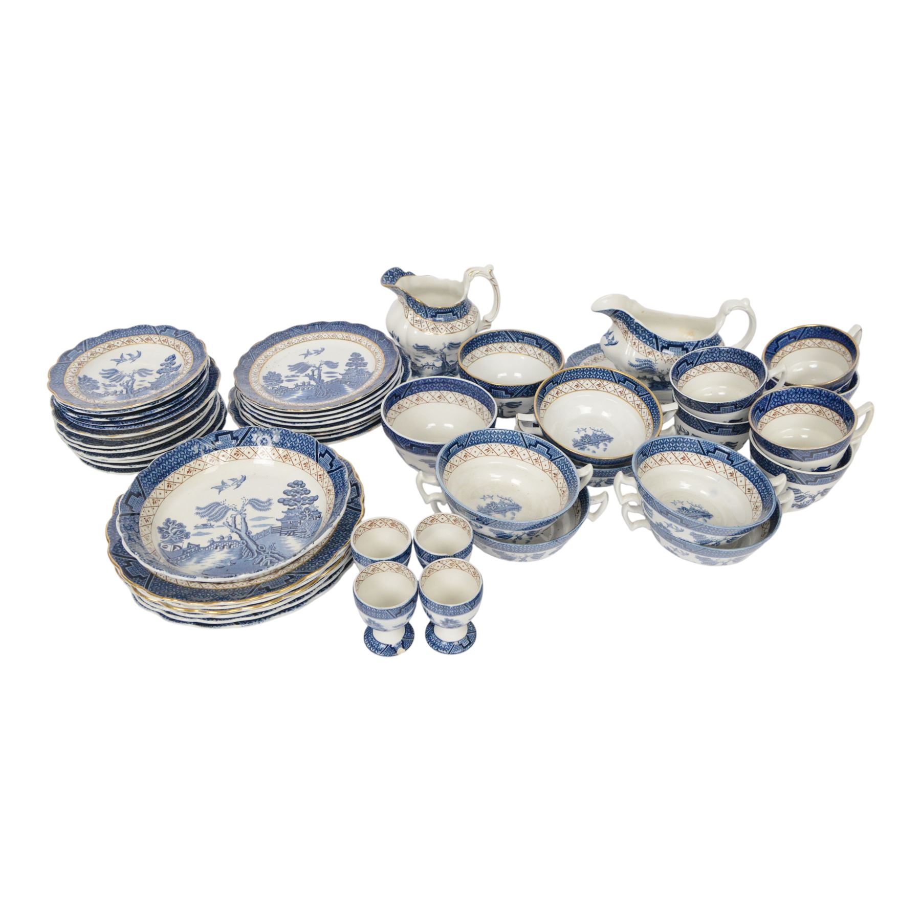 Booths Real Old Willow tea and dinner service, including six dinner plates, eight side plates, four egg cups, milk jug etc 