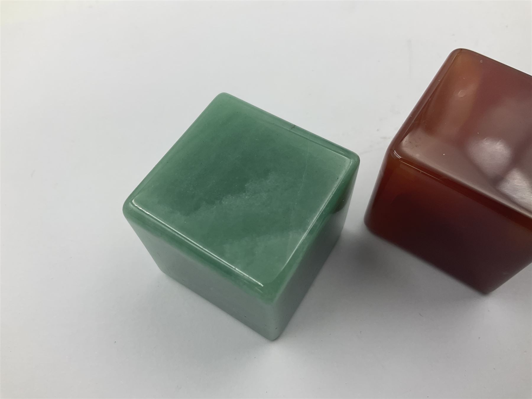 Ten cube mineral specimens, each cut and polished to highlight natural formations, including tiger eye, green aventurine, rose quartz, opalite, amethyst etc, H3cm 