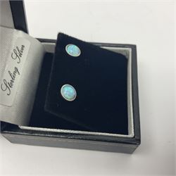 Pair of silver and opal stud earrings, boxed 