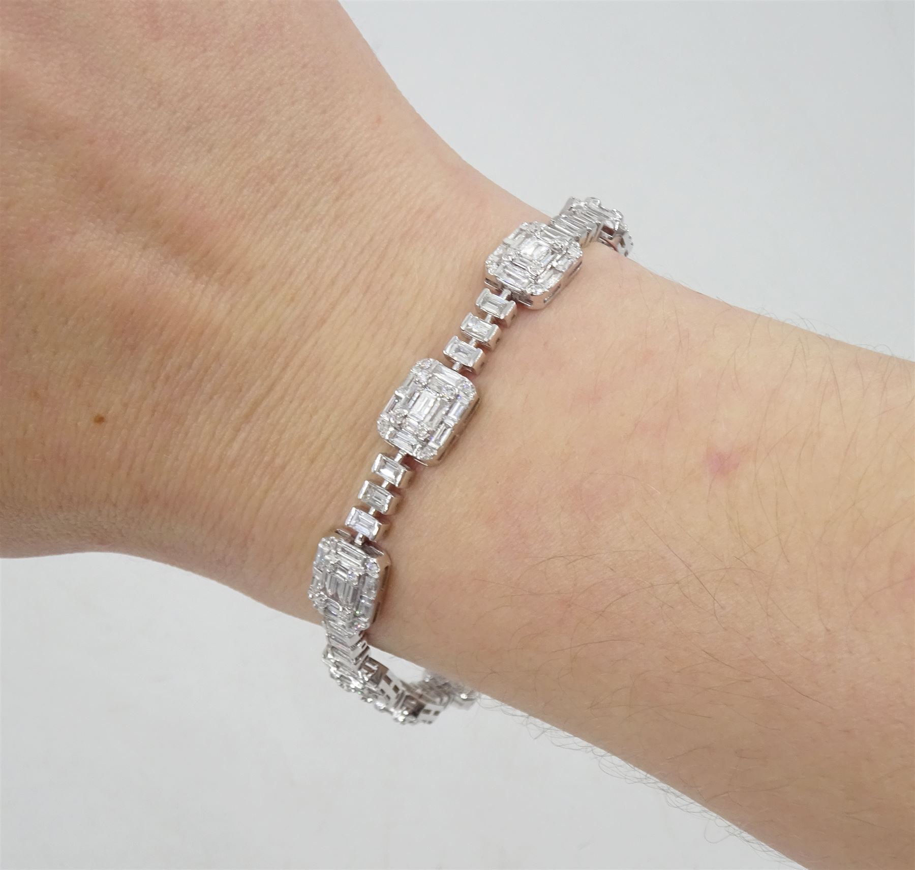 18ct white gold baguette and round brilliant cut diamond bracelet, stamped 750, total diamond weight approx 4.70 carat