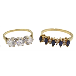 Gold marquise shaped sapphire and diamond ring and a gold three stone cubic zirconia ring, both hallmarked 9ct