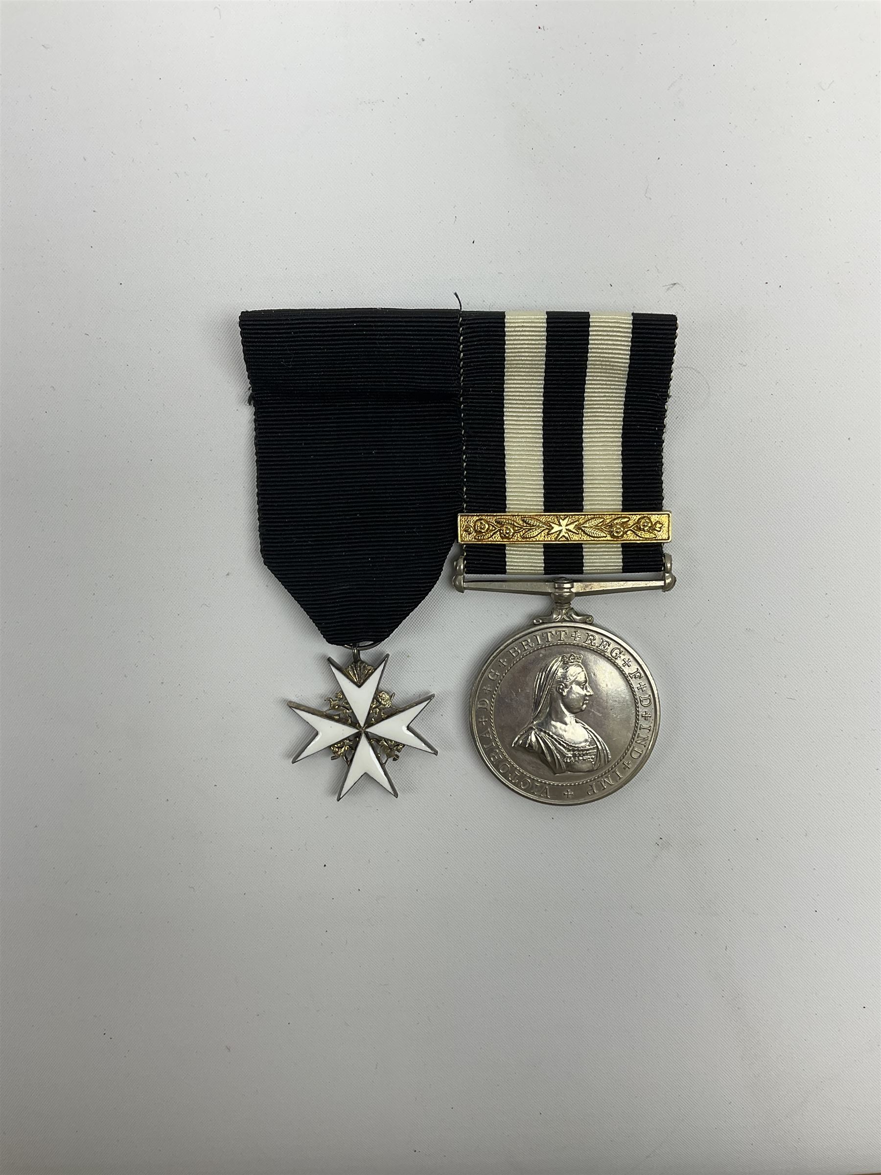 St John's Ambulance Brigade Service medal of the Order of St John and Order of St John enamelled badge