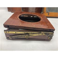 Collation of folding plate cameras of various sizes folding plate in mahogany and lacquered brass, together with camera plates and slides
By vendors repute some slide are from the Gandolfi workshop