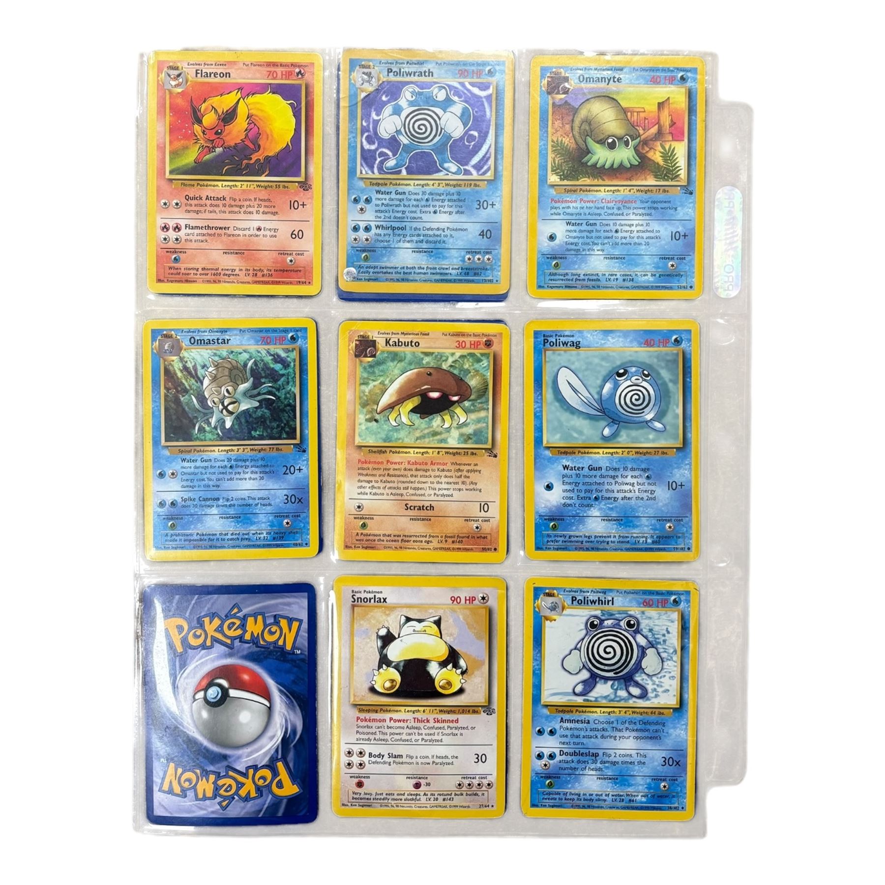 Collection of mainly vintage Pokemon cards including Charizard Base Set Holographic number 4/102 and two Ancient Mew 2000 promo cards, some housed within plastic wallets and some loose