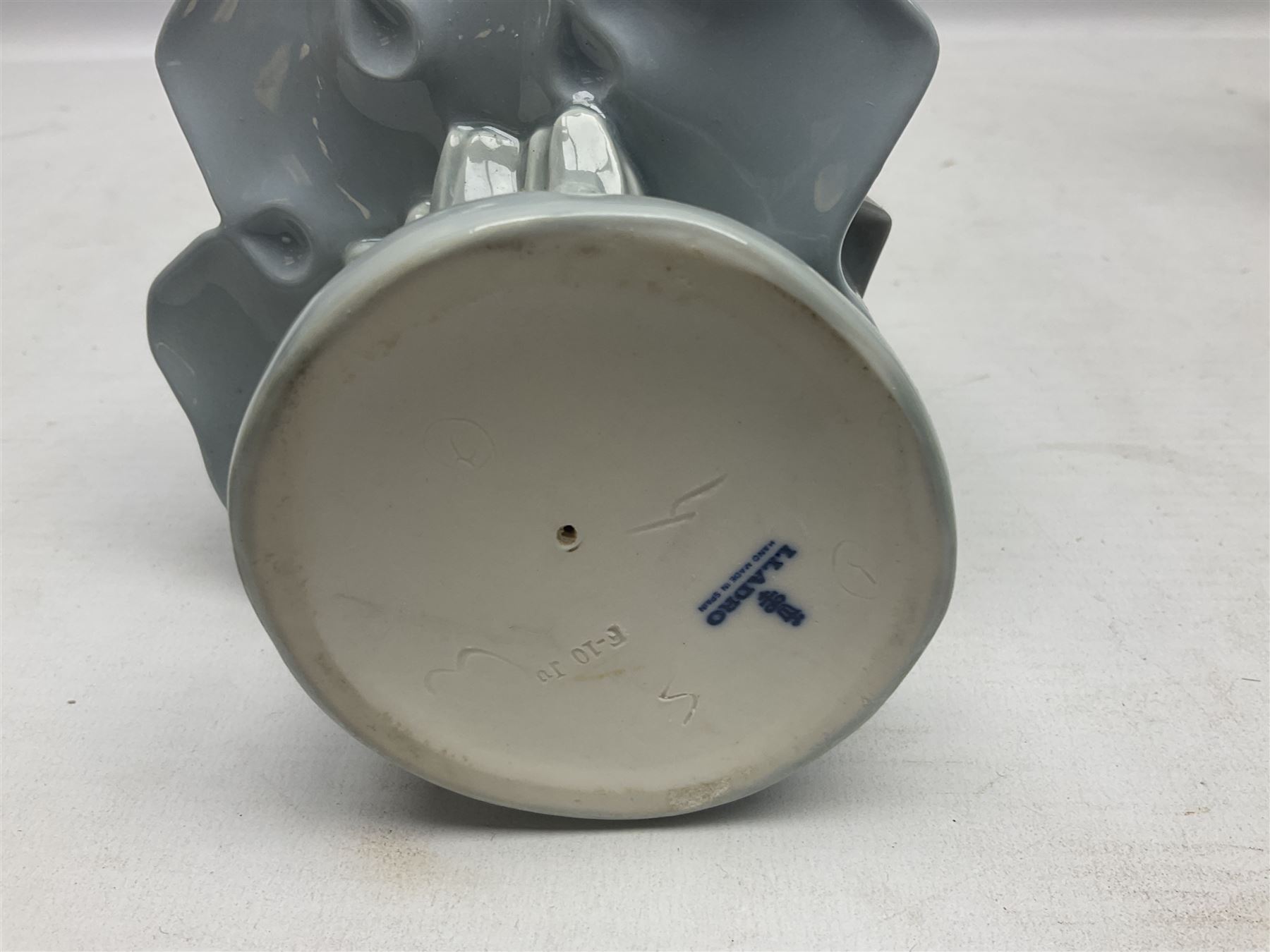 Three Lladro figures, comprising Dutch Girl with Braids no 5063, Dutch Girl with Duck no 5066 and Aracely with Ducks, all with original boxes, largest example H25cm