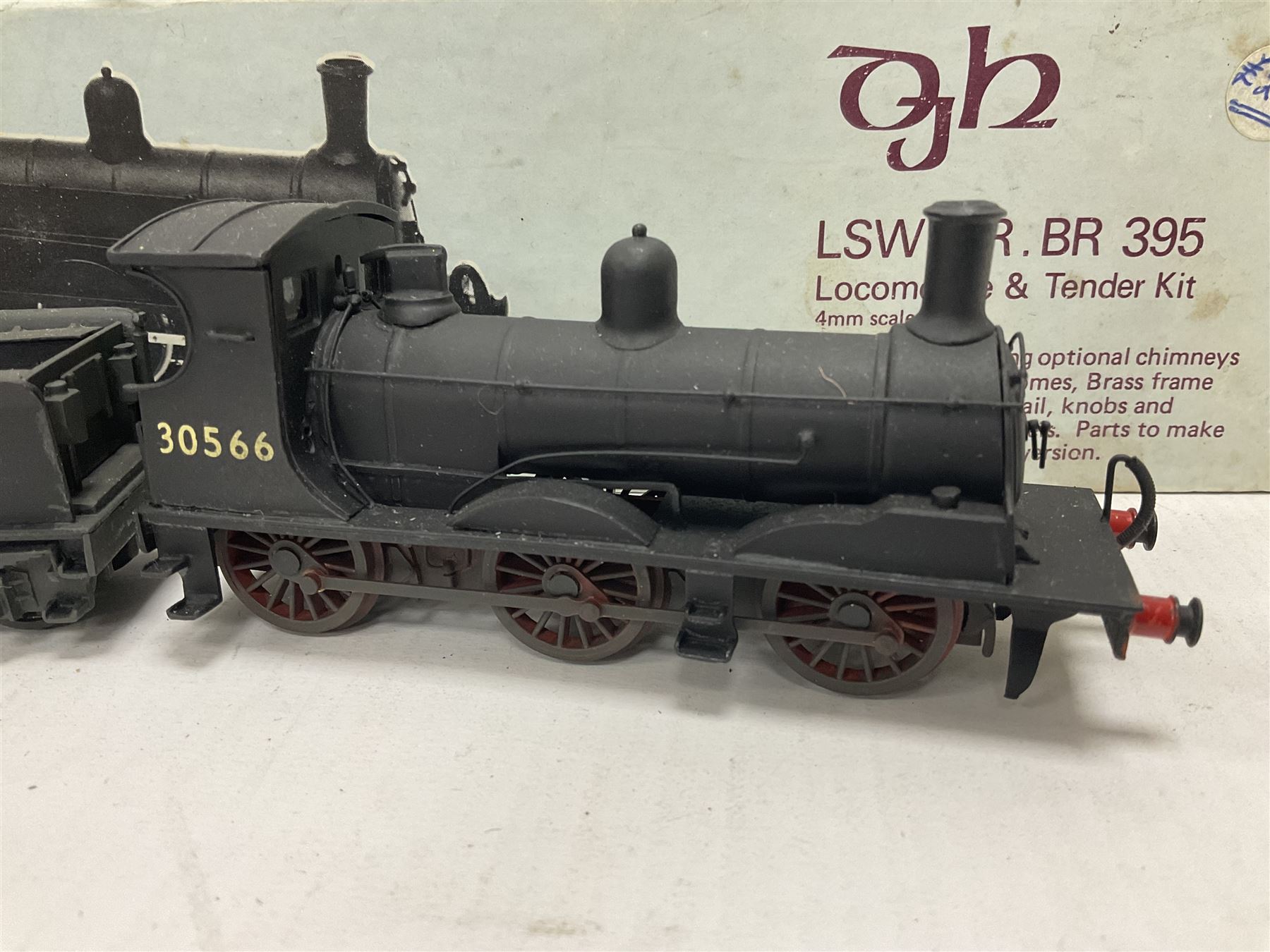 ‘00’ gauge - two kit built steam locomotive and tenders comprising Class 0395 Jumbos 0-6-0 no.30566 finished in BR black; Class C2X Large Vulcans 0-6-0 no.32434 finished in BR black; both with DJH Models boxes (2) 