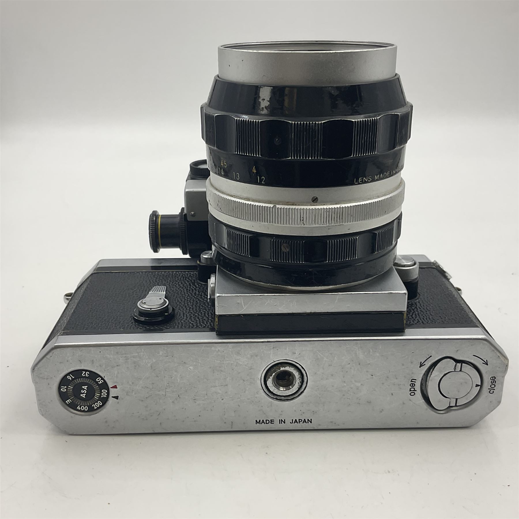 Nikon F Photomic NKJ camera body, marked 'US Dept of Defense ... U.S.A.F DA Nang, serial no. 6561811, with 'Nippon Kogaku NIKKOR-P Auto 1:2.5 f=105mm' lens, serial no. 212154