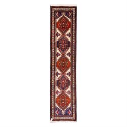 North West Persian Ardebil hand-knotted runner, ivory field decorated with row of large he...