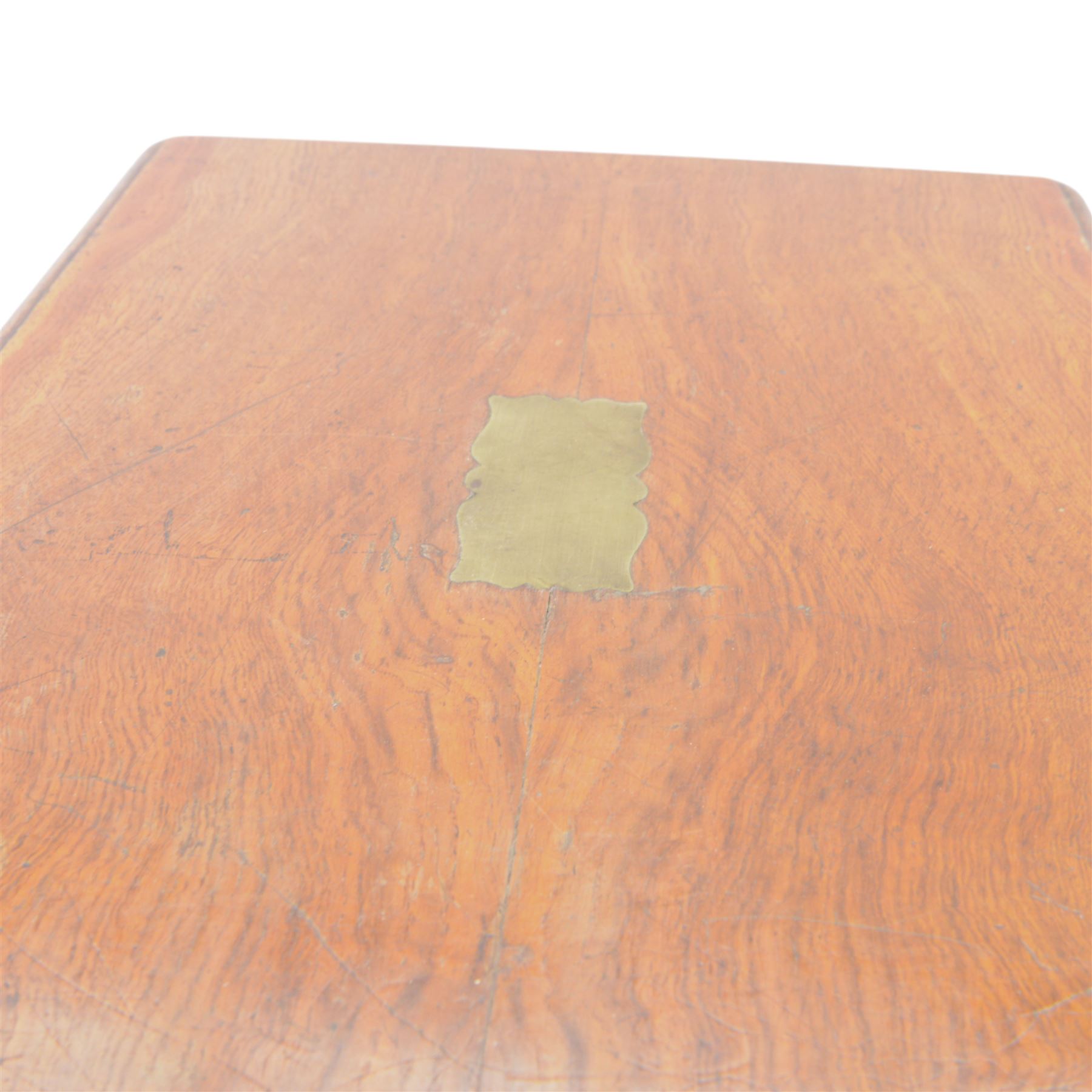 Oak table top canteen cabinet, the top with inset vacant brass cartouche, with pair of panelled doors opening to reveal four interior drawers with inset brass handle, containing a selection of silver plated flatware, 29cm x 40cm x 51cm