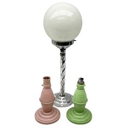 Two art deco table lamps with plastic turned columns raised on a circular feet, together with a chrome twisted table lamp with a opaline milk glass globe shade, tallest example H52cm