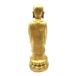 20th century Chinese gilt brass model of Ananda, H47cm