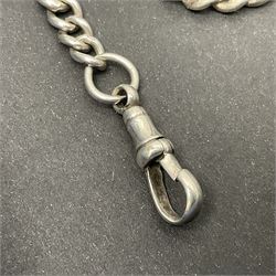 Early 20th century silver tapering Albert chain, hallmarked to T bar and clips, with lion passant stamped on each link