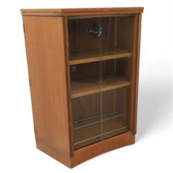 Turnbridge of London - Mid 20th century teak cocktail cabinet, with fold out top extending to 160cm, with twin doors revealing a shelved interior, the back with sliding glazed doors, raised on a recessed plinth base with castors