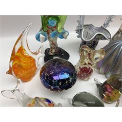 Robert Held iridescent art glass sea urchin paperweight, signed to underside, together with Murano glass clown and a collection of other glass paperweights and animals, etc 