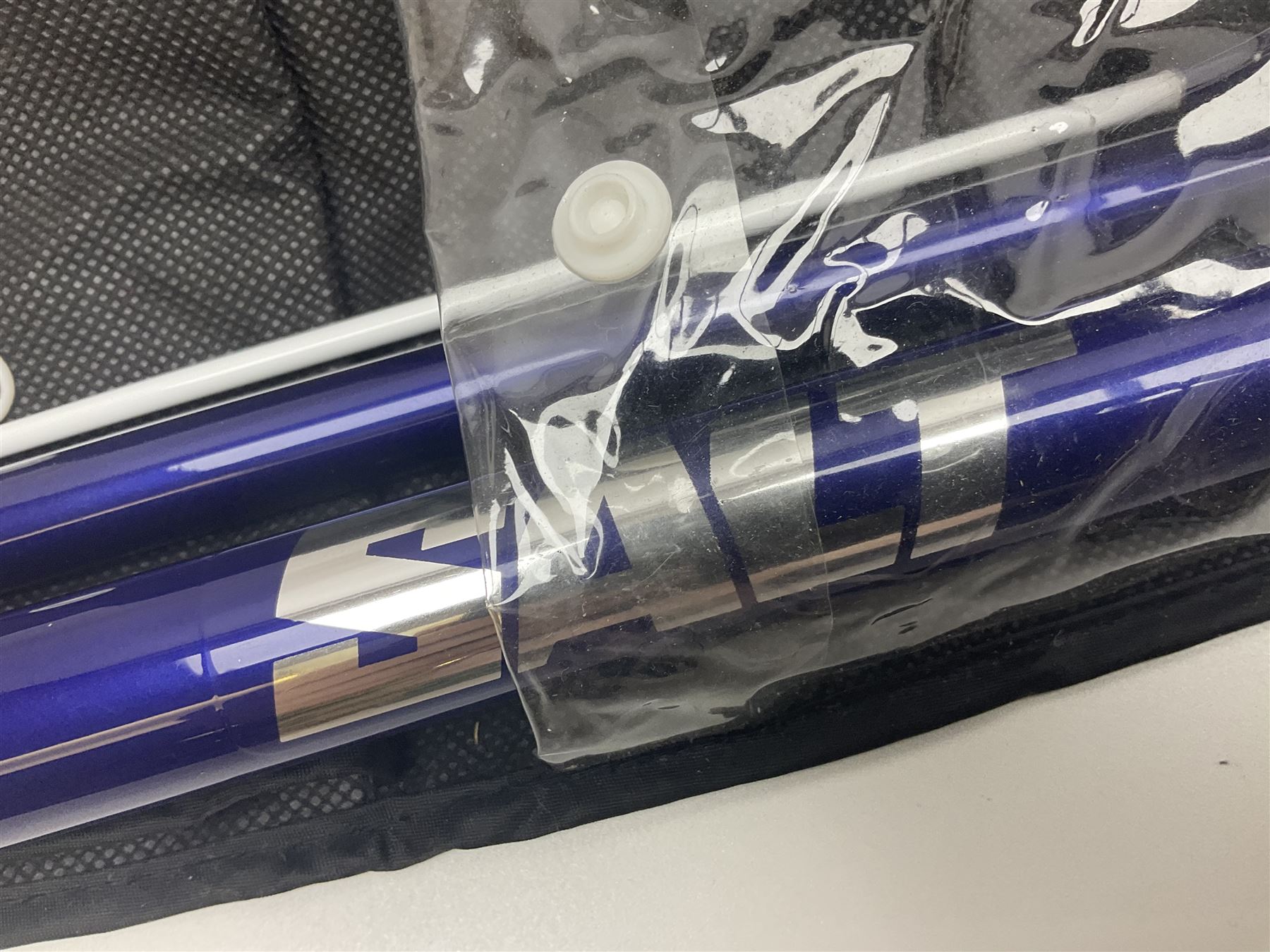 Collection of fishing memorabillia and equipment, including an Allcocks three piece split cane trout fly rod, Shakespeare Salt 3600 surf rod, two tackle bags, Old Red Seastreak multiplier reel, Sportext Saltwater fixed spool reel, fishing dvds, etc