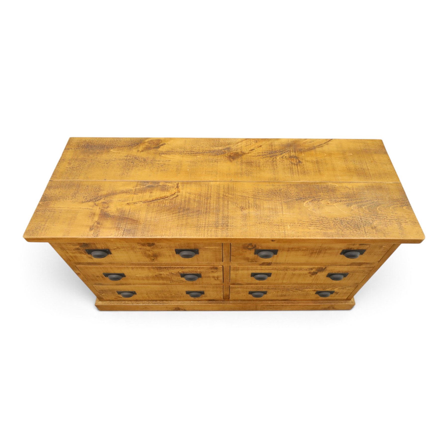 Indigo Furniture - large rustic oak chest, rectangular top fitted with six drawers with metal pull handles, on skirted base