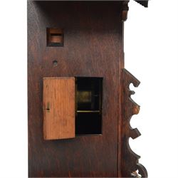 19th century Black Forest cuckoo mantel clock with carved architectural case, with eight day gong striking movement