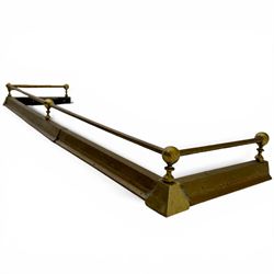 Three 20th century brass fenders, two with pierced Art & Crafts design rails, largest W156cm, D 45cm 