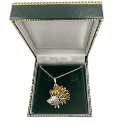 Silver Baltic amber hedgehog pendant, stamped 925 and boxed 