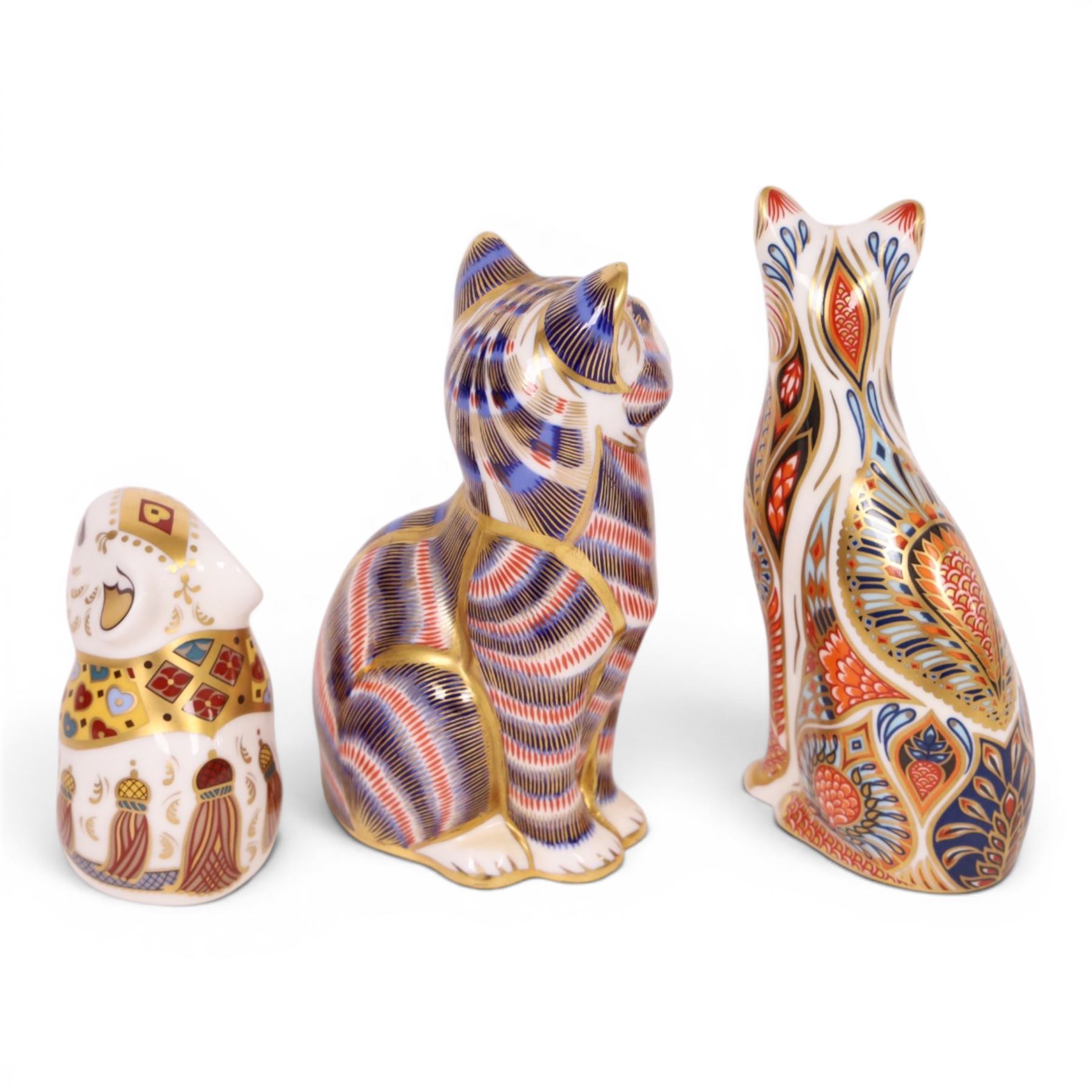 Three Royal Crown Derby paperweights, comprising Field Mouse gold stopper, Siamese cat gold stopper and seated cat gold stopper