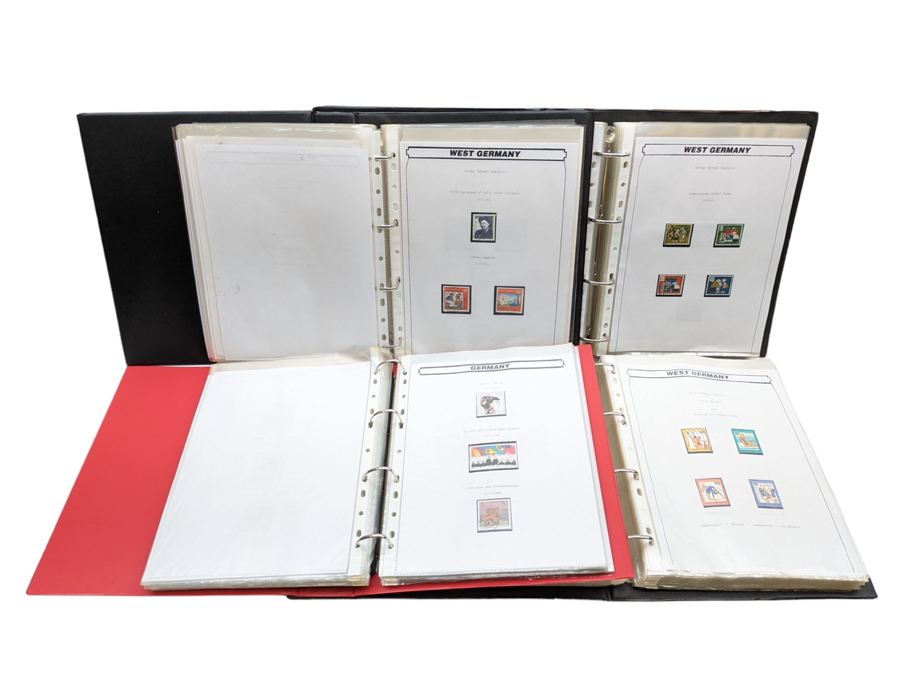 Mostly West German stamps, including stamps on covers, pairs and blocks, various postmarks, commemorative issues etc, housed in four ring binder folders