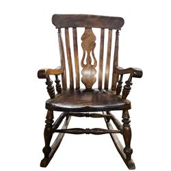 Late 19th century elm and beech farmhouse rocking chair, pierced splat and lath high back over saddle seat with turned supports