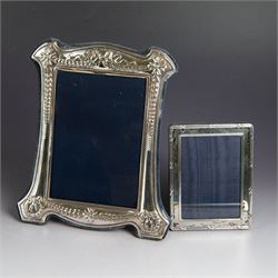 Two modern silver photograph frames, comprising small rectangular example with reed and ri...