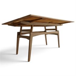 20th century Scandinavian limed oak metamorphic dining-to-coffee table, the rectangular extending top with draw-leaf sides, over an adjustable-height action base, on splayed supports united by stretchers