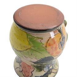 Paul Jackson Studio Pottery dished plate, decorated with Kingfishers and Koi fish amongst yellow irises, D26cm, together with a Paul Jackson Studio Pottery mug, of bellied form decorated with fruits, H11cm, each signed and dated 1996 and 1994