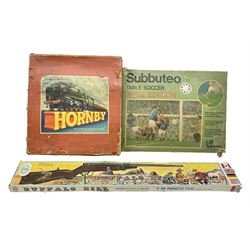 1970s Italian Universal F.V.M. Buffalo Bill toy rifle with break barrel action L82cm; boxed; Subbuteo Club Edition table football game; boxed but incomplete; and quantity of '0' gauge model railway items including four tin-plate passenger coaches, track and Hornby box lid