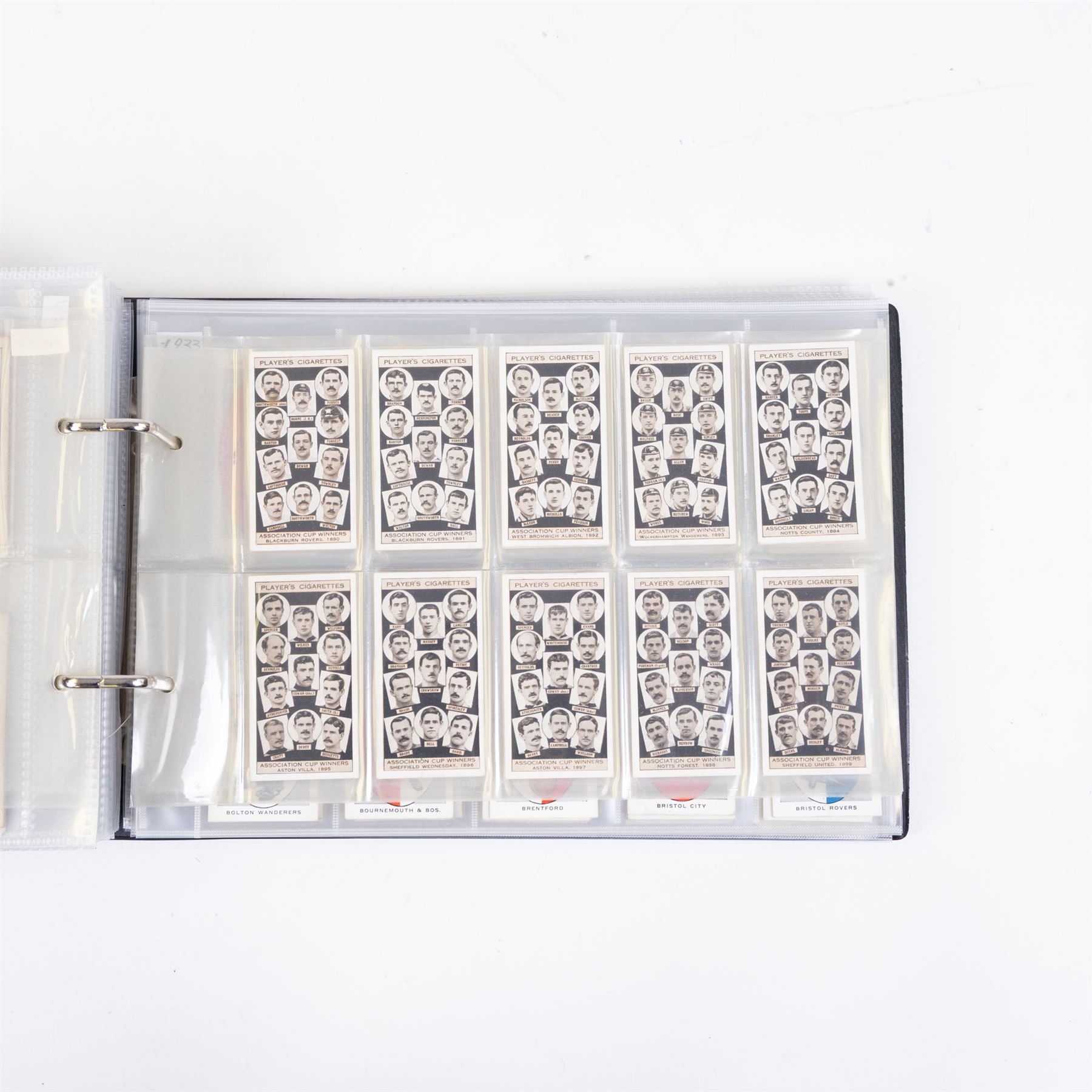 Collection of Edwardian and later Football related trading and cigarette cards, including forty-nine of fifty 1906 Ogden's Football Club Colours, 1922 PALS Footall series, ninety of one hundred 1925 Gallaher Famous Footballers, complete set of forty-four 1926 Ogden's Captains of Association Football Clubs and Colours, complete set of fifty 1927 Players Football Caricatures by MAC,  complete set of fifty 1927 Players Football Caricatures by RIP,  complete set of fifty 1930 Players Association Cup Winners, complete set of 50 1933 Ogdens AFC Nicknames etc, housed in brown cigarette card album