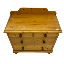 Victorian pine chest, fitted with two short and two long drawers, raised back