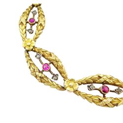 Late 19th / early 20th century French 18ct gold ruby and diamond fancy link bracelet, each laurel wreath link with a round cut ruby and two diamond chips either side and separated by a flower head, French horse's head hallmark