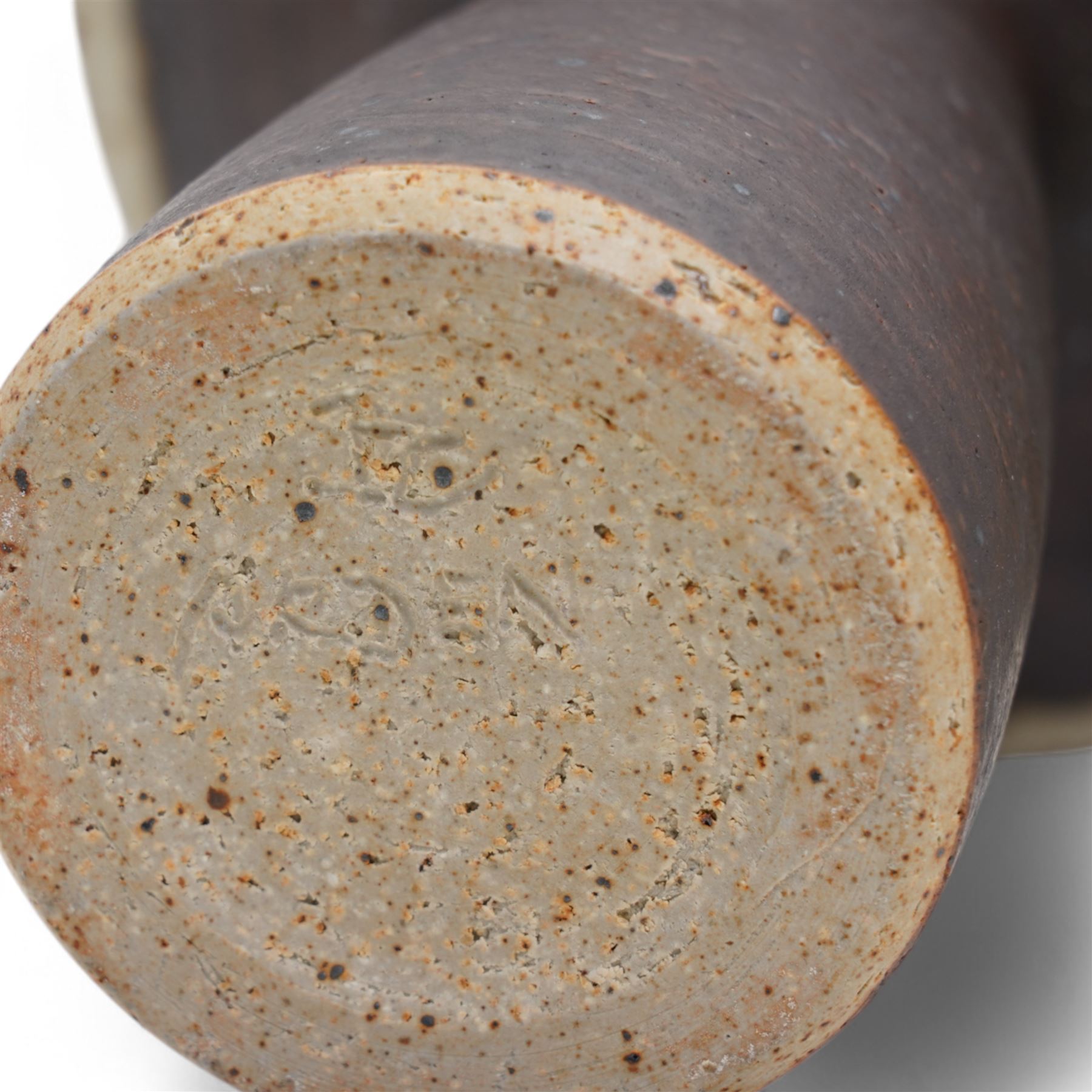 Barbara Cass (1921-1992) for Arden pottery; two studio pottery stoneware vases of slender tapering form with exaggerated flared rims, one with sunburst decoration, in cream and brown glazes, impressed marks to bases, tallest H18.5cm (2)