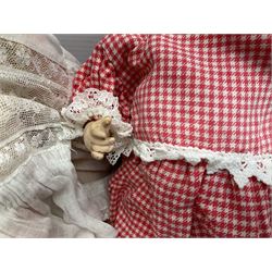 Heubach Koppelsdorf Germany bisque head doll with applied hair, sleeping eyes, open mouth with teeth and composition body with jointed limbs; marked 'Heubach Koppelsdorf 342.6/0 Germany' H34cm; Armand Marseille bisque head baby doll with moulded hair, sleeping eyes, open mouth and composition body with jointed limbs; marked 'A.M. Germany 351./8.K.; and BND London all composition doll (3)