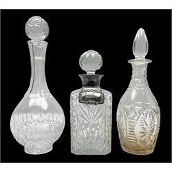Silver mounted cut glass decanter, with silver collar and glass stopper, hallmarked JP, Birmingham, 1972, with silver scotch label, hallmarked A Marston & Co, Birimingham,1970, with two other glass decanters