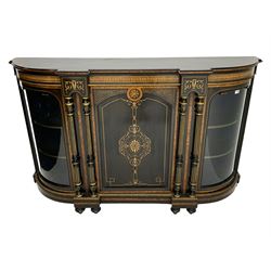 Victorian ebonised and inlaid credenza, break-front with curved ends, the front fitted with two curved glazed doors and central panelled door, inlaid with scrolling foliate and star motifs, quadruple turned and fluted pilasters to front, gilt egg and dart moulded edge on plinth base with figured walnut band, on turned feet