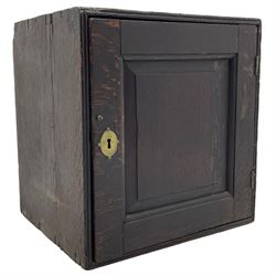 18th century oak spice cupboard, single panelled door enclosing eight drawers of various sizes, reed moulded front edges