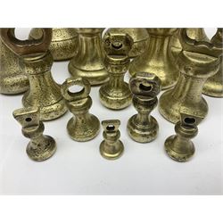 Set of seventeen Victorian brass bell weights