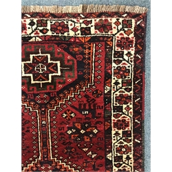  Persian red ground rug, geometric pattern field, repeating border, 238cm x 162cm  