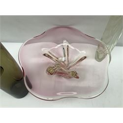 Two Whitefriars glass jugs, together with a Swedish Pukeberg art glass vase and three art glass bowls, including large pink example, some signed to base, tallest H30.5cm