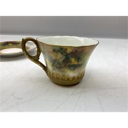 Early 20th century Royal Worcester cabinet cup and saucer, painted with a peacock, together with Royal Worcester ewer hand decorated with roses and Coalport miniature hand painted cabinet cup, jug H10cm 