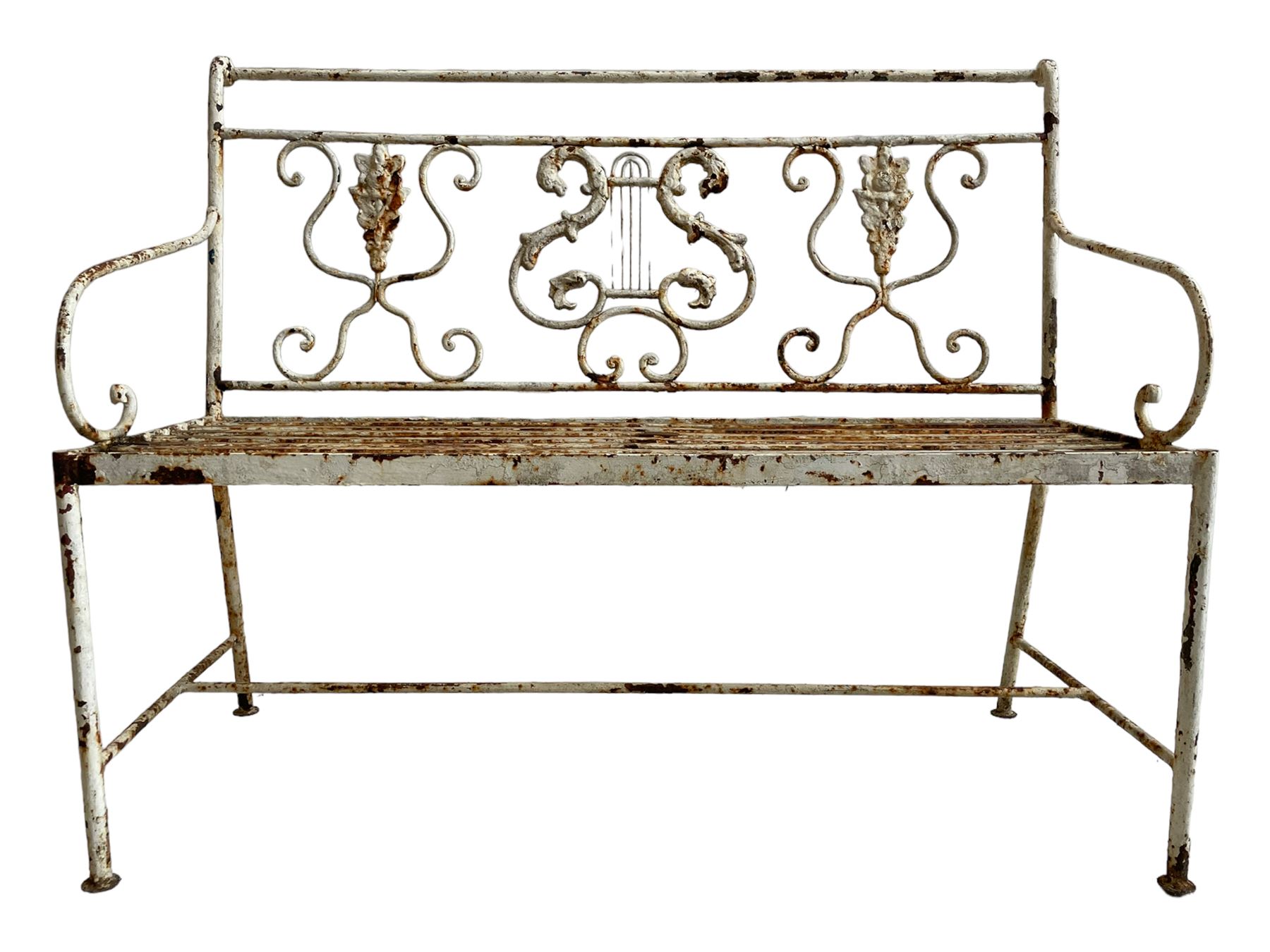 Regency design wrought metal garden bench, central lyre back with foliate S-scrolls with serpent masks, flanked by two floral mouldings and further scrolling, metal slatted seat on straight supports joined by H-stretcher  - THIS LOT IS TO BE COLLECTED BY APPOINTMENT FROM DUGGLEBY STORAGE, GREAT HILL, EASTFIELD, SCARBOROUGH, YO11 3TX